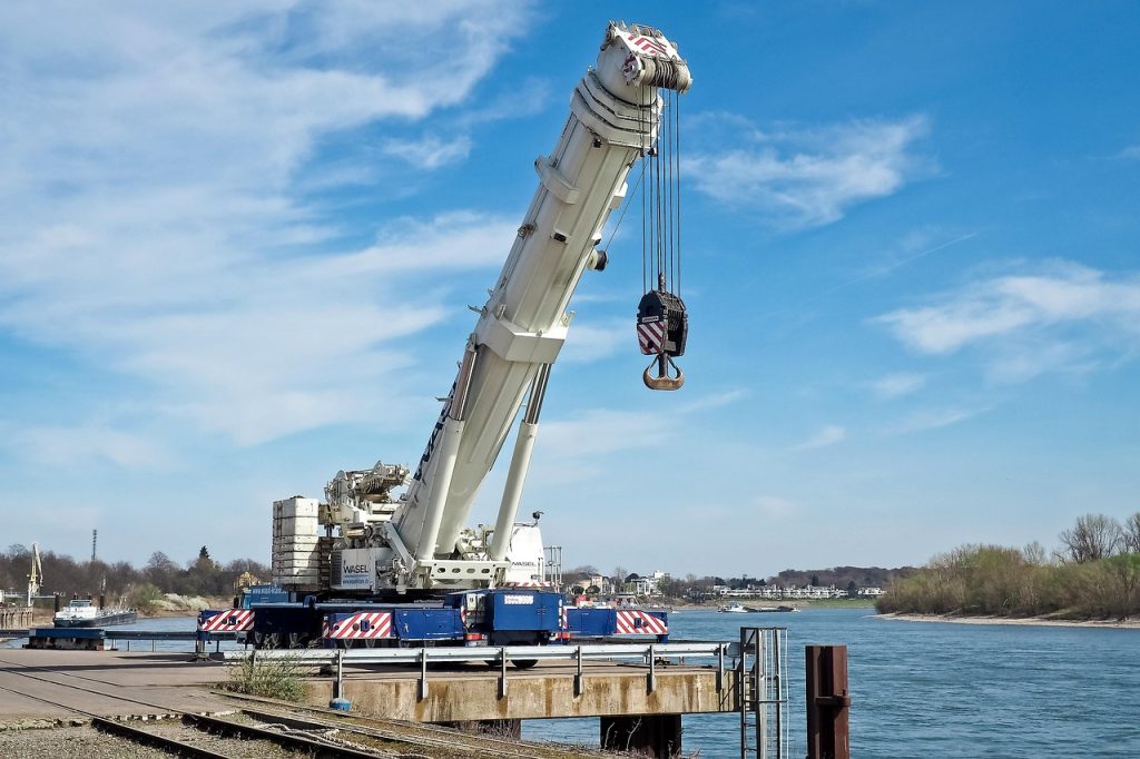 vehicle, crane, machine, construction crane, to build, construction site, construction work, heaven, to lift, blue, high, construction, technology, work, assembly, building, project, building construction, heavy load, working machine, hydraulics, nature, load crane, construction machine, boom, clouds, load lifter, lift loads, crane boom, load hook, load, crane arm, industrial crane, winch, port, dusseldorf, lifting crane, hook, jib crane, industry, metal, stole